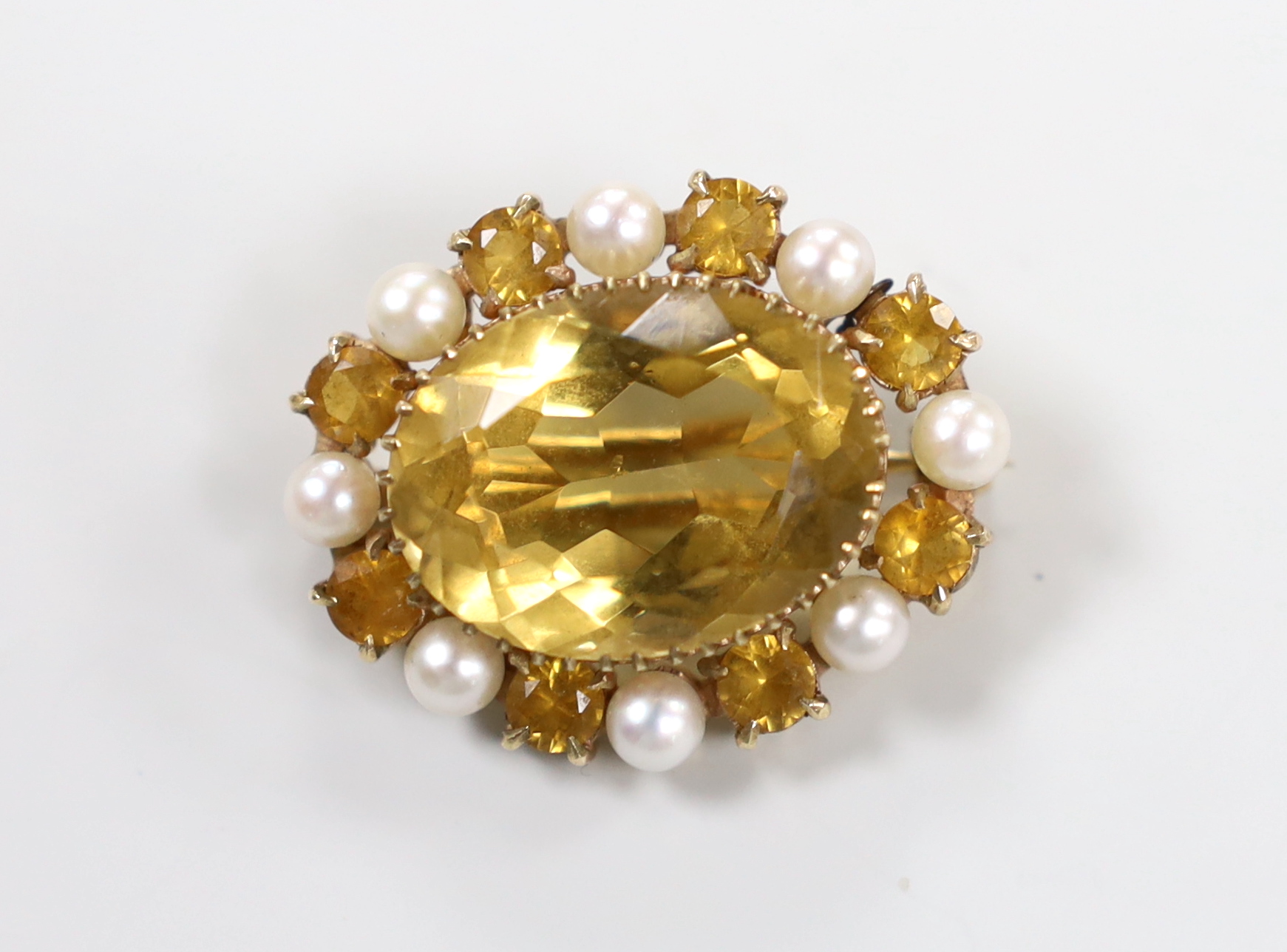 A modern 9ct gold mounted, citrine and cultured pearl set oval brooch, by Cropp & Farr, 30mm, gross weight 9.4 grams.